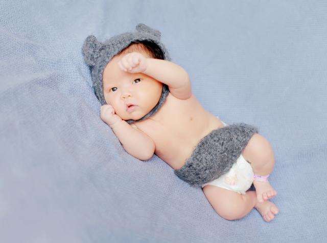 In blue hat, full view. 640x477