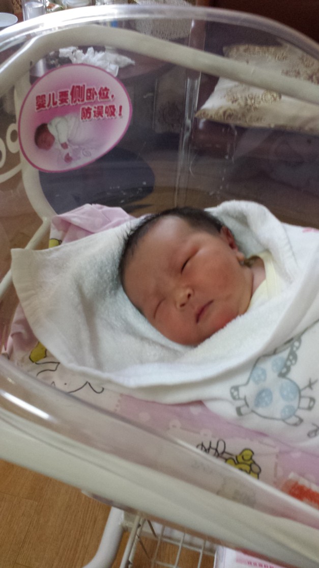 Sapphire Lin trying to open an eye