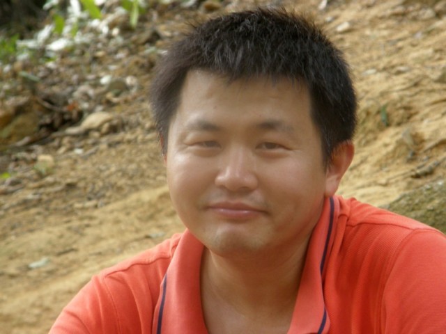 tired smile on Shenzhen Wutong Mountain